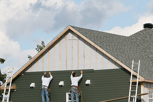 Professional Storm Damage Siding Repair technician working in West End, NY